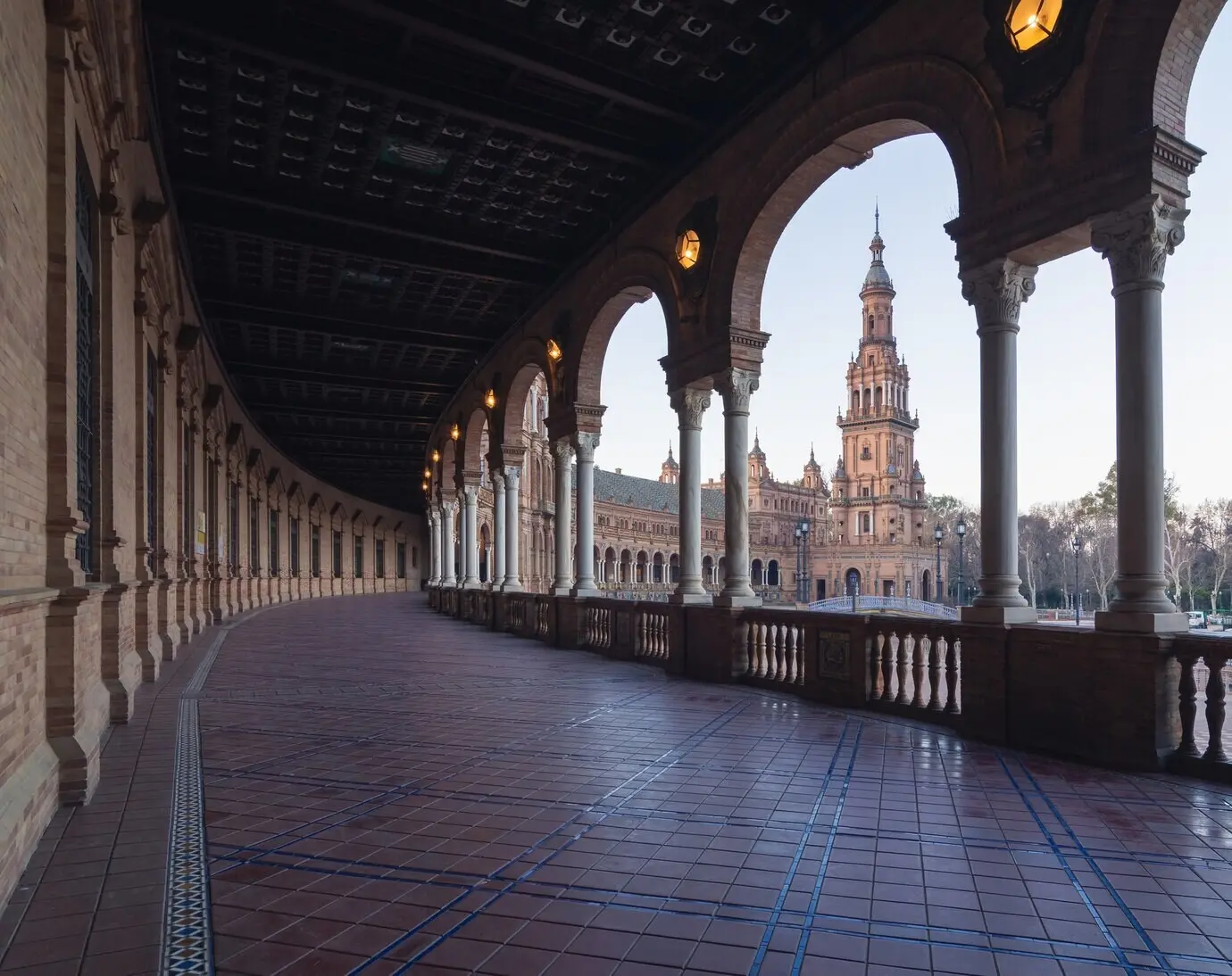 Spain Square in Seville, Spain, surrounded by buildings during the day.